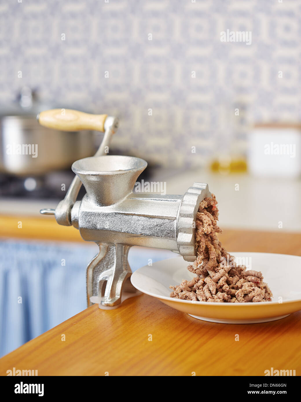 meat and grinder. Minced meat and meat grinder. Meat grinder machine  chopping uncooked ground meat Stock Photo - Alamy