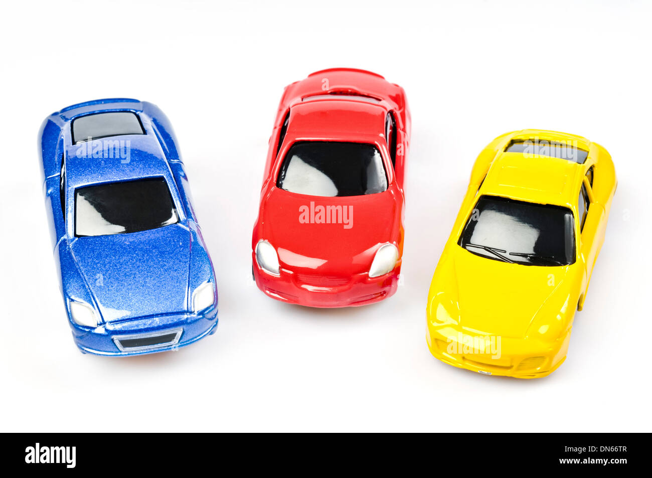 three colourful toy cars Stock Photo