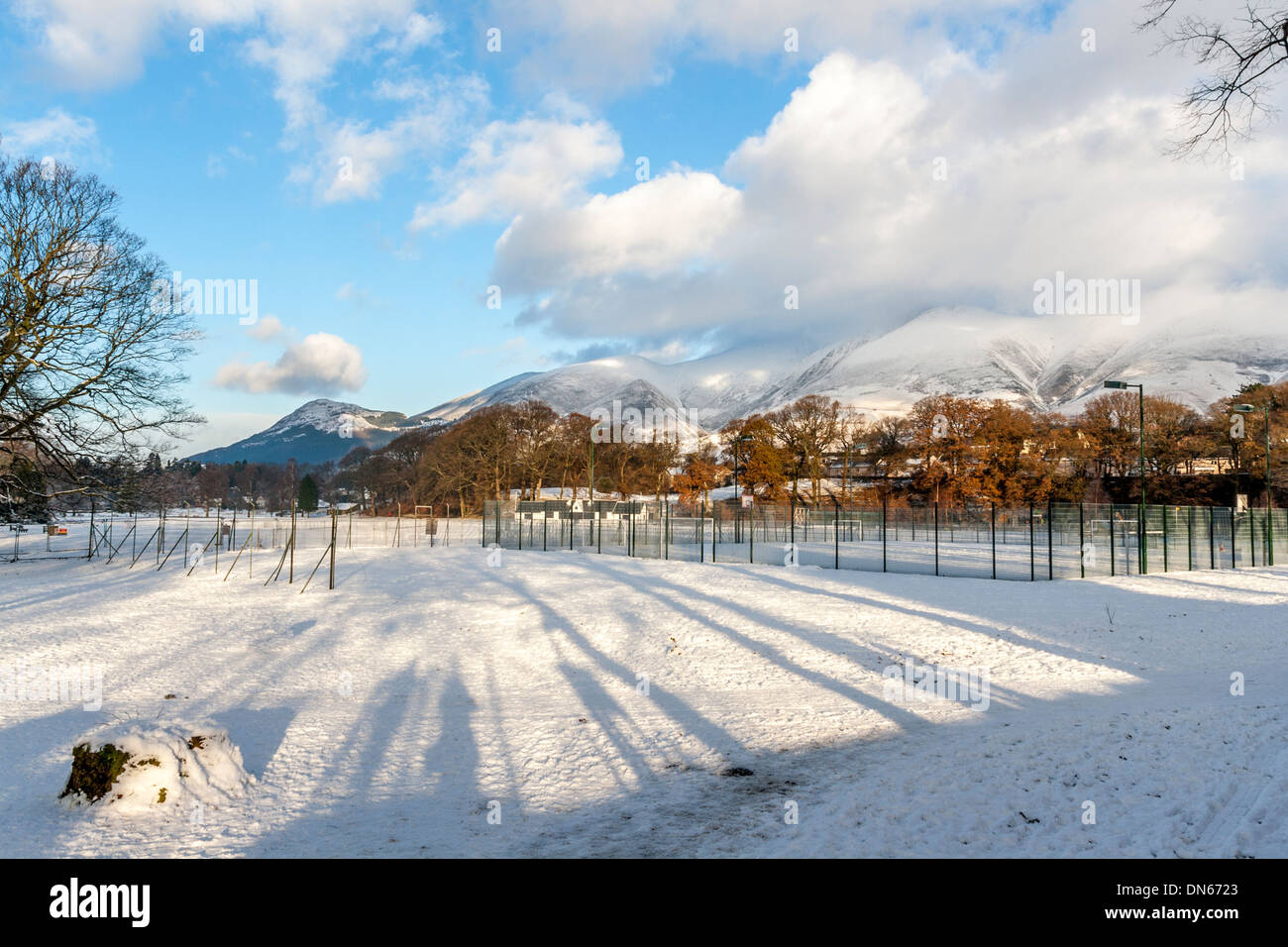 A sunny snowy day looking across the the mountains in the distance