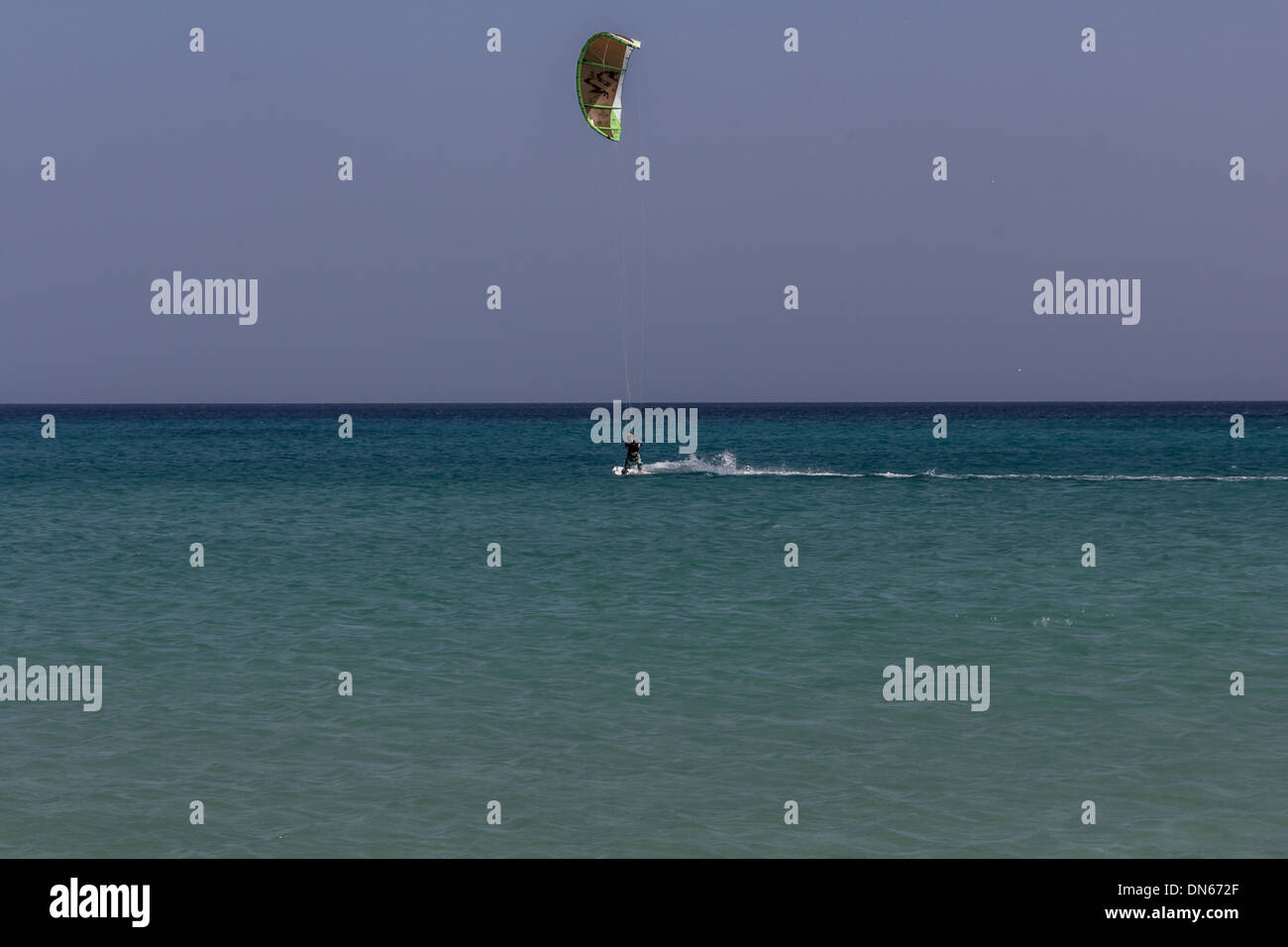 Kite surfer in the sea Stock Photo