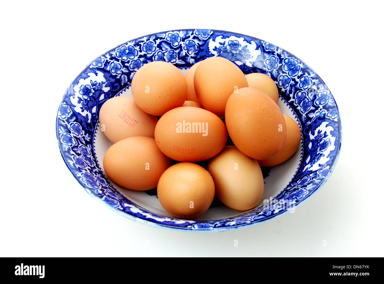 Fresh free range eggs,one dozen eggs in a bowl. Stock Photo
