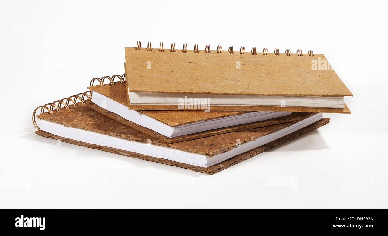 Three notebooks or sketchpads, with handmade straw pulp cover Stock Photo