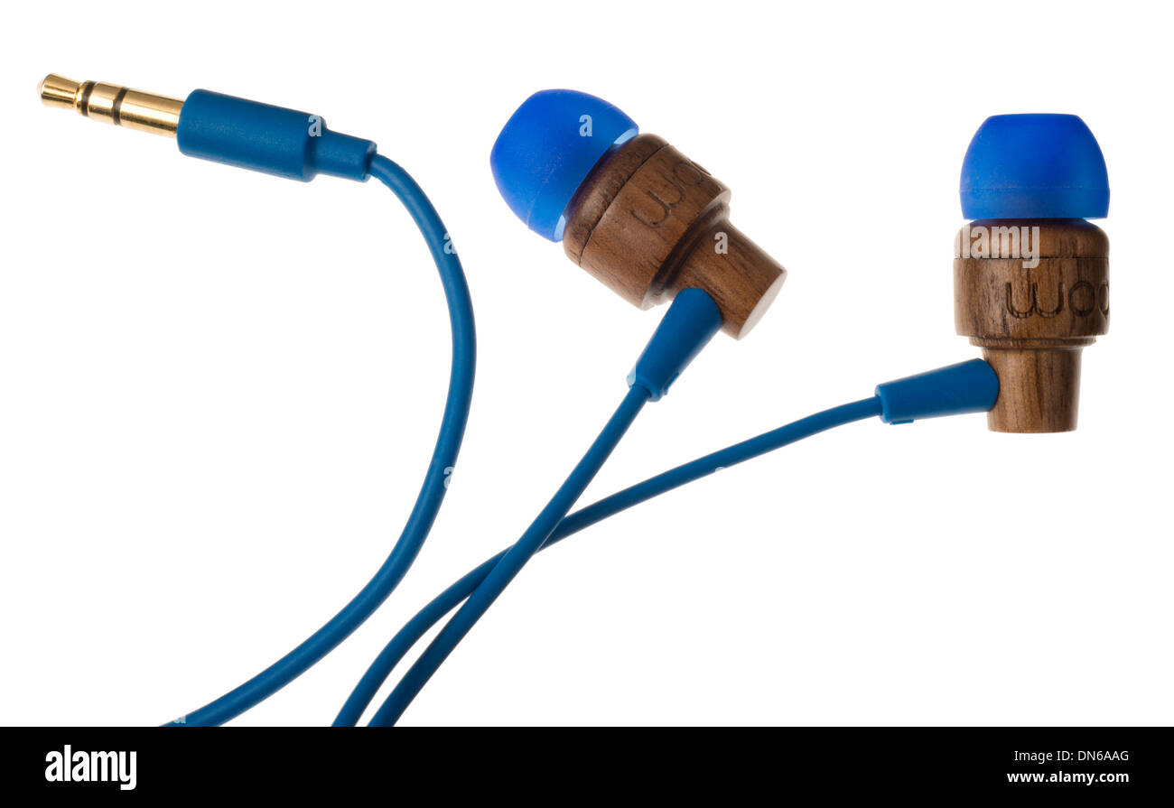 Wooden earphones with a blue wire and phone jack. Stock Photo