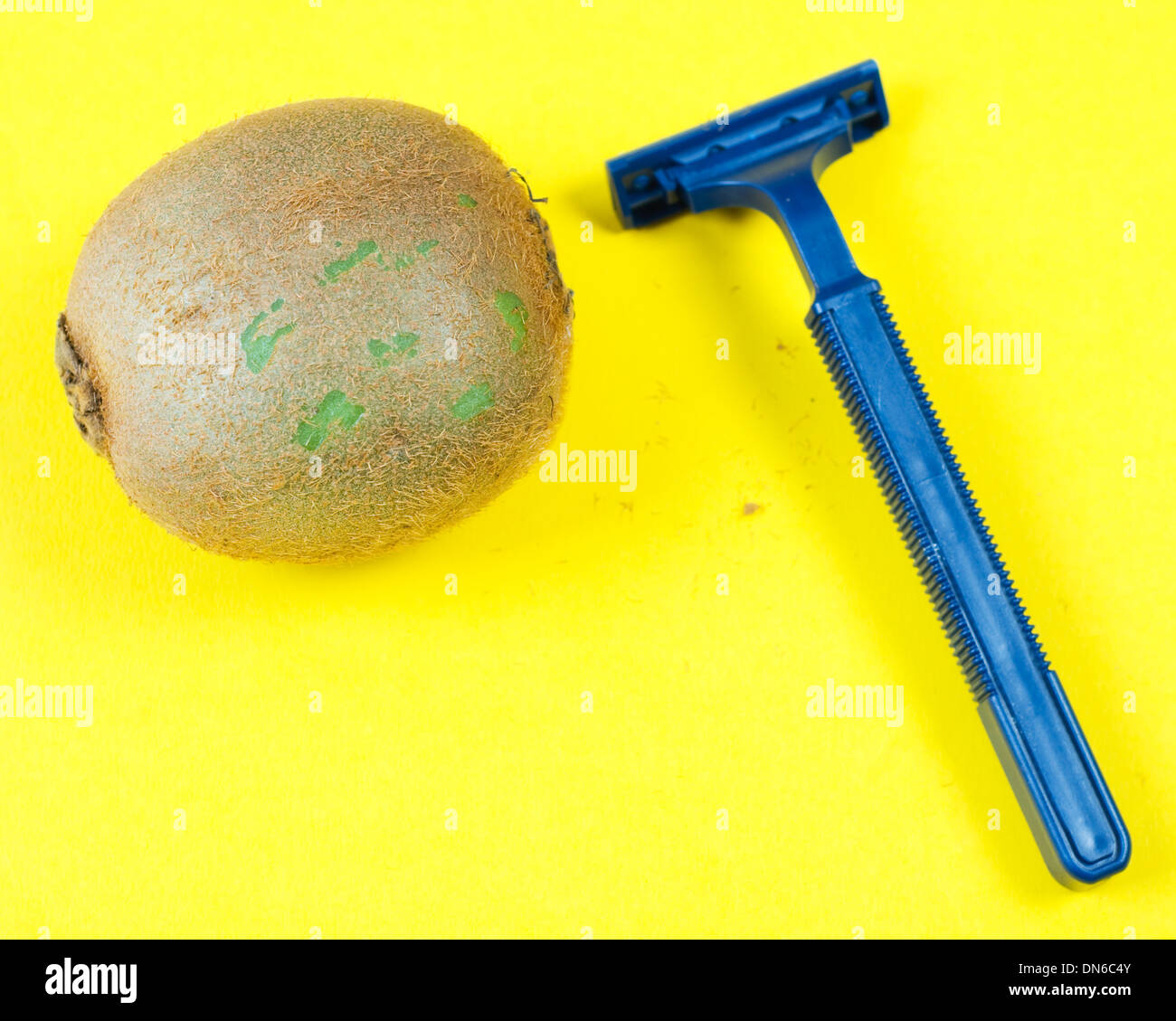 concept of safety shaving isolated on yellow Stock Photo