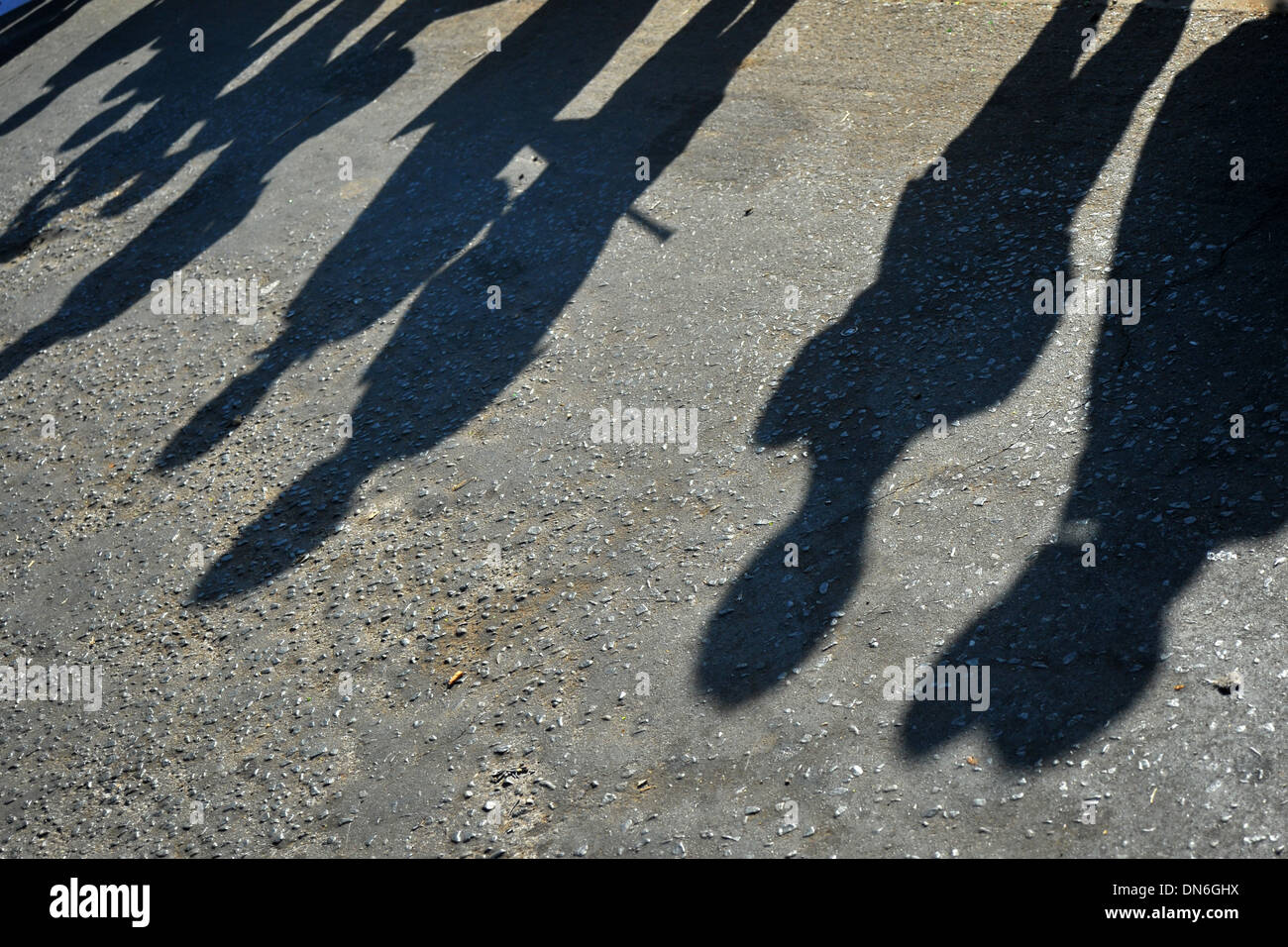 The shadows of protesters at a demonstration in Soweto, South Africa ...