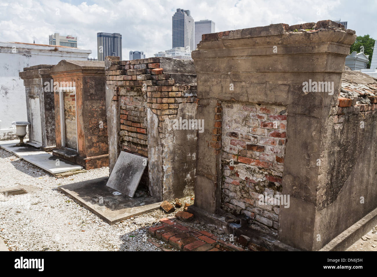 Row of crumbling brick tombs in St. Louis Cemetery in the Treme district of New Orleans Stock Photo