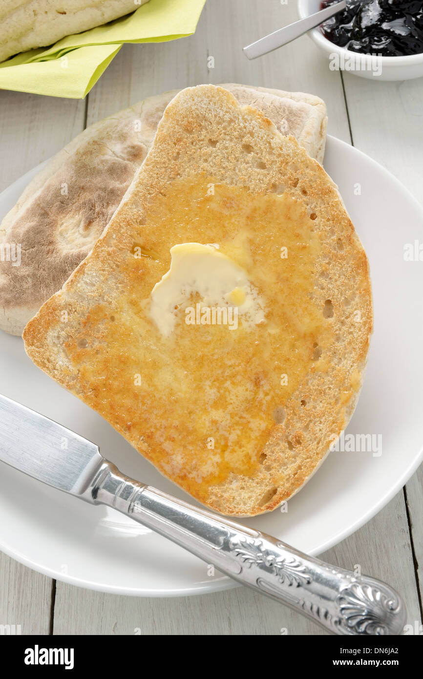 Irish Soda Bread or Farls split and toasted and buttered Stock Photo