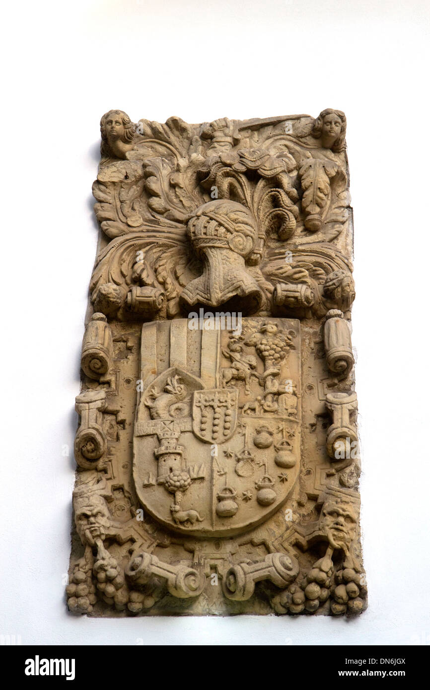Coat of arms carved in a stone wall at Santillana del Mar, Cantabria, Spain. Stock Photo