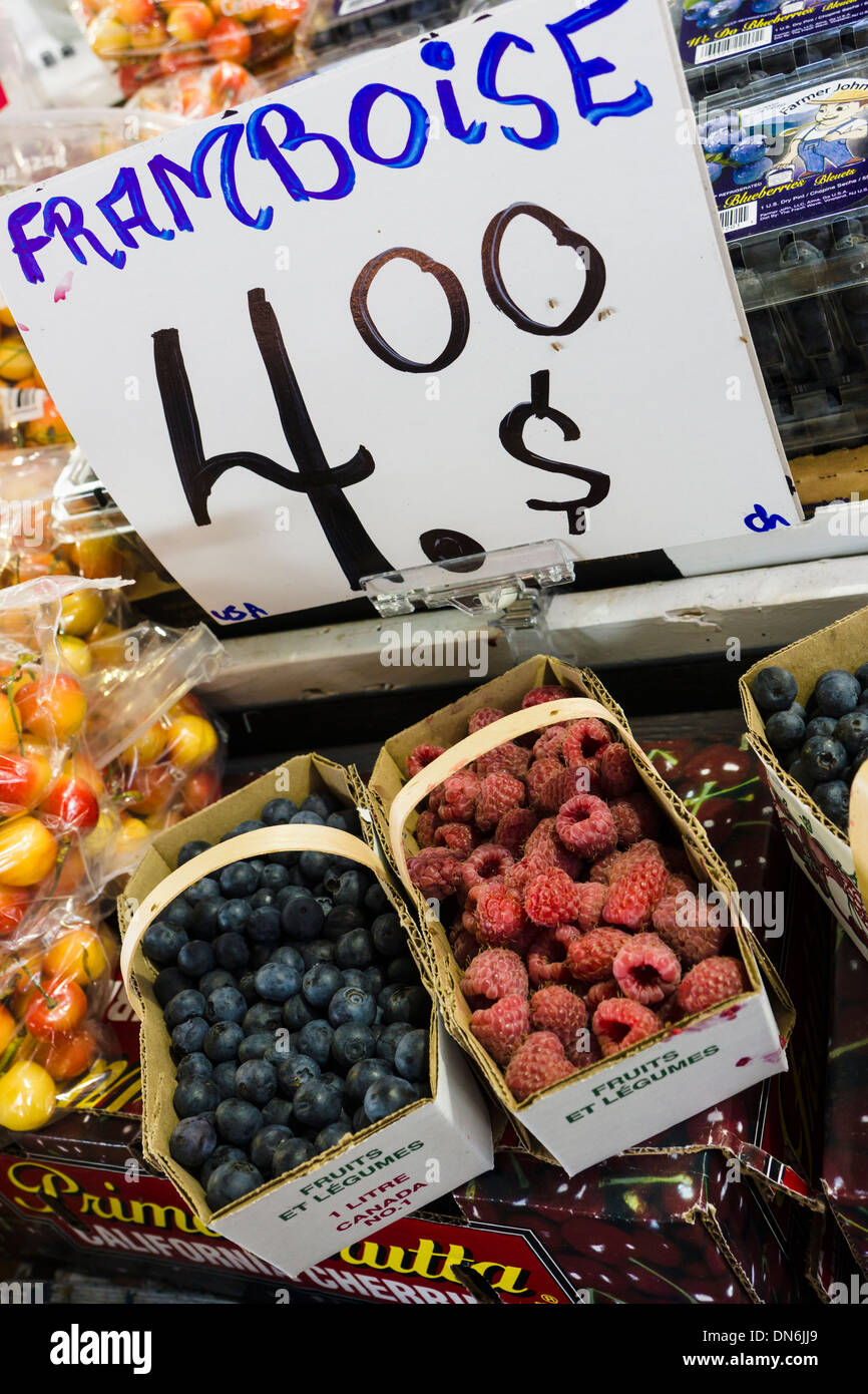 Raspberries and blueberries at Jean-Talon Market. Montreal, Quebec, Canada. Stock Photo