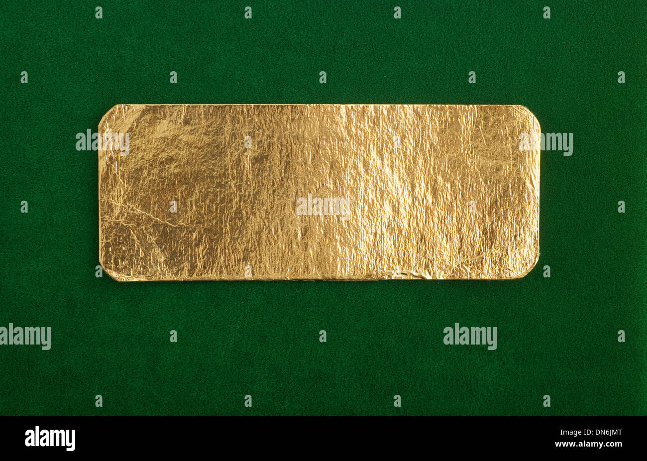 golden sign on artificial green grass Stock Photo