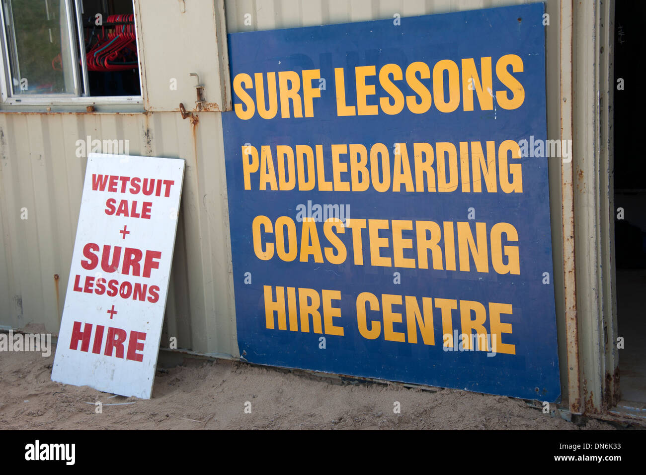 Surf Lessons Sign Wetsuit Hire Coasteering Stock Photo