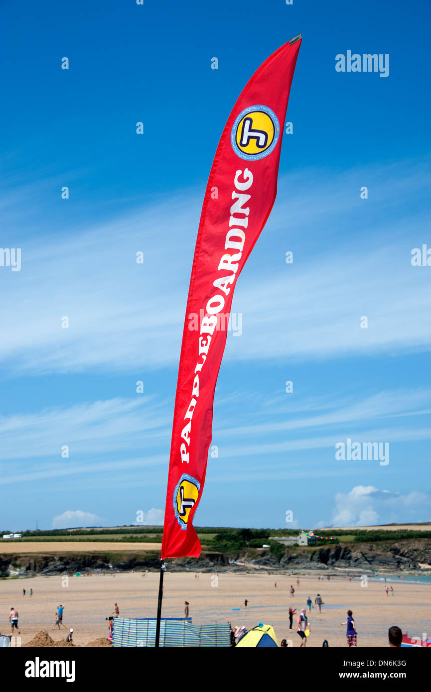 Paddleboarding banner sign against bright blue sky Stock Photo