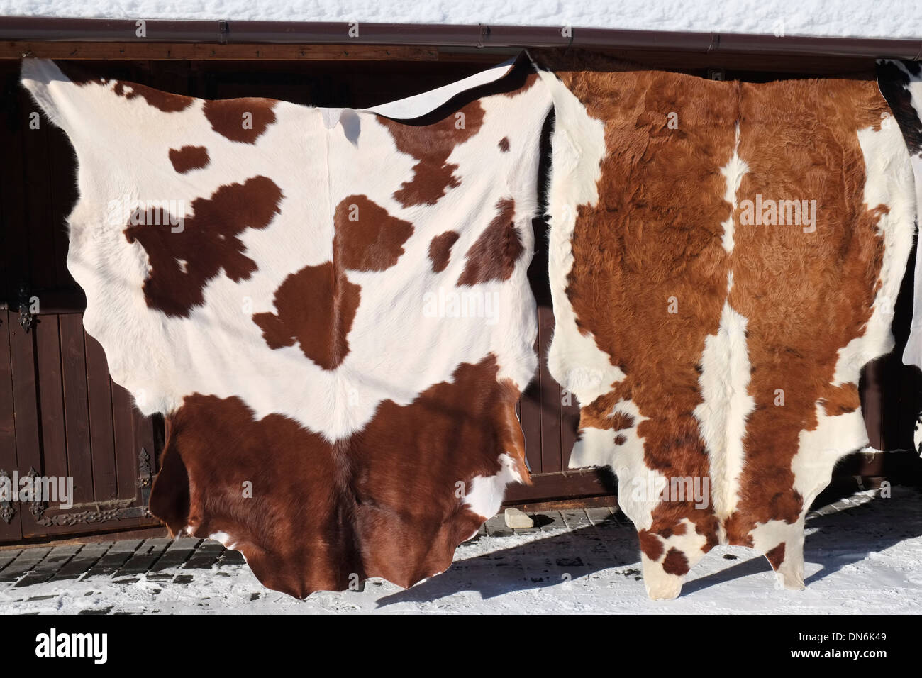 Cow hides for sale at the Zakopane market, Poland. Stock Photo