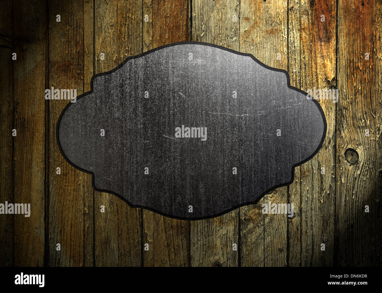 metal sign on wood plank background Stock Photo