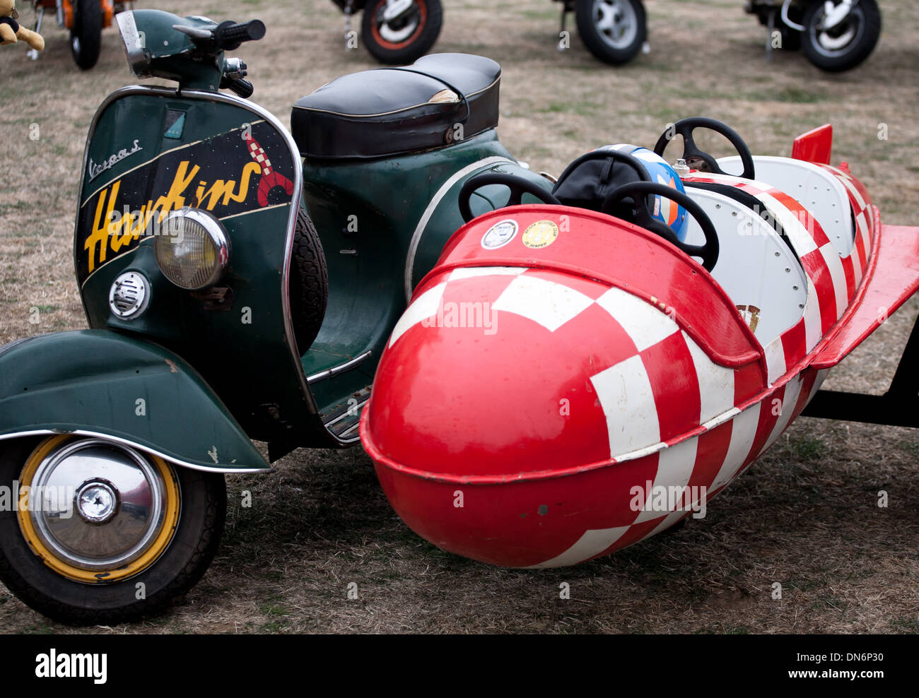 Green 'Hawkins' Vespa S with red and white Tin Tin style rocket sidecar at 2013 Isle of Wight August Bank Holiday Scooter Rally Stock Photo