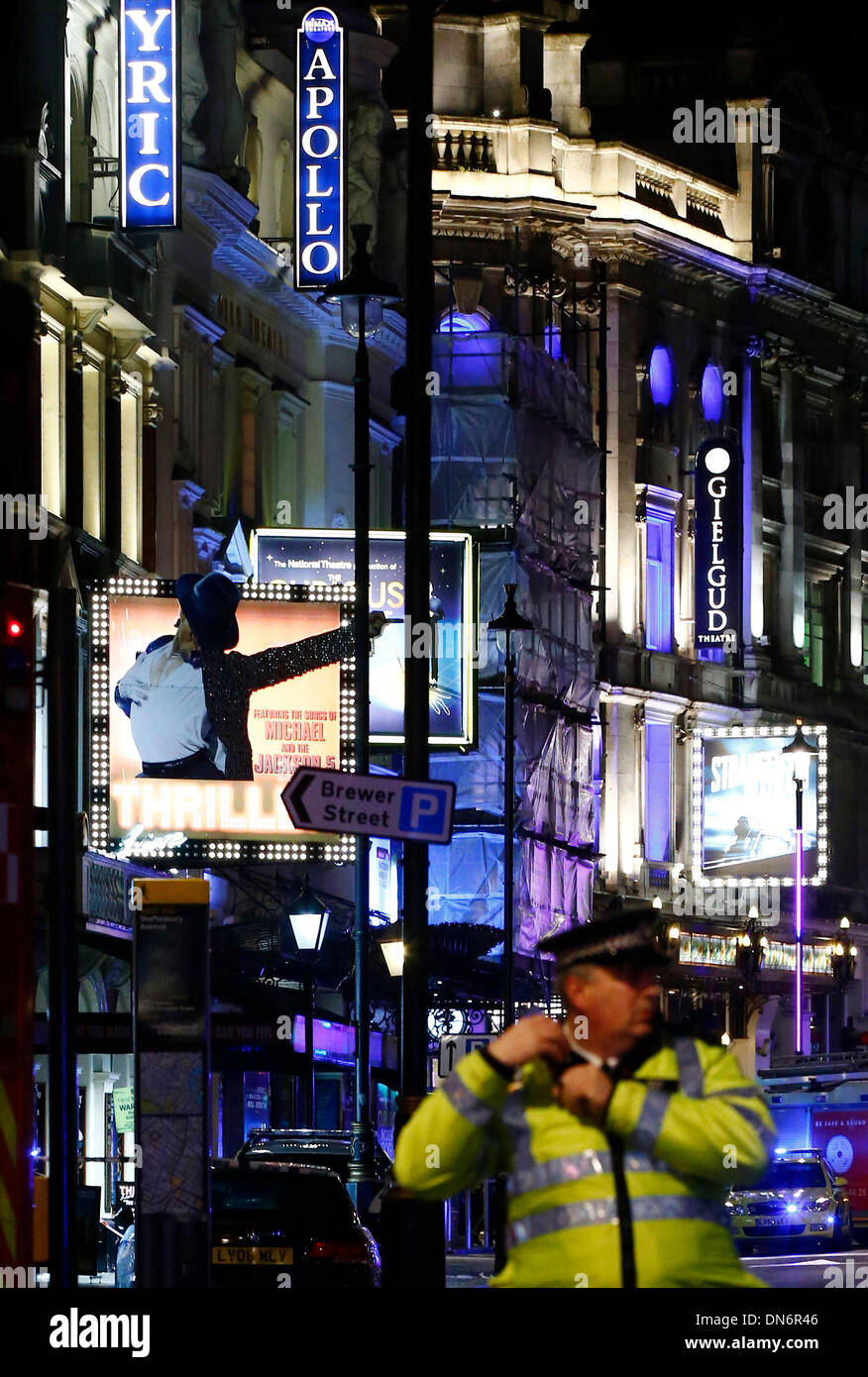 London. 20th Dec, 2013. Rescuers work at the site of a roof collapse at a theatre in central London on Dec. 19, 2013. Some 88 people were injured, including 7 serious cases, after part of the roof in London's Apollo Theatre collapsed on Thursday. Credit:  Yin Gang/Xinhua/Alamy Live News Stock Photo