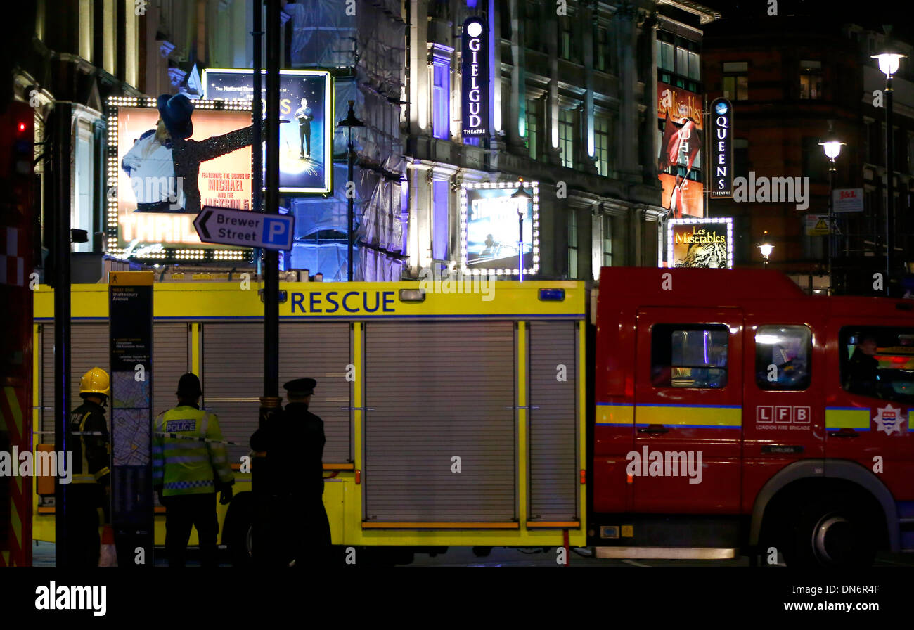London. 20th Dec, 2013. Rescuers work at the site of a roof collapse at a theatre in central London on Dec. 19, 2013. Some 88 people were injured, including 7 serious cases, after part of the roof in London's Apollo Theatre collapsed on Thursday. Credit:  Yin Gang/Xinhua/Alamy Live News Stock Photo