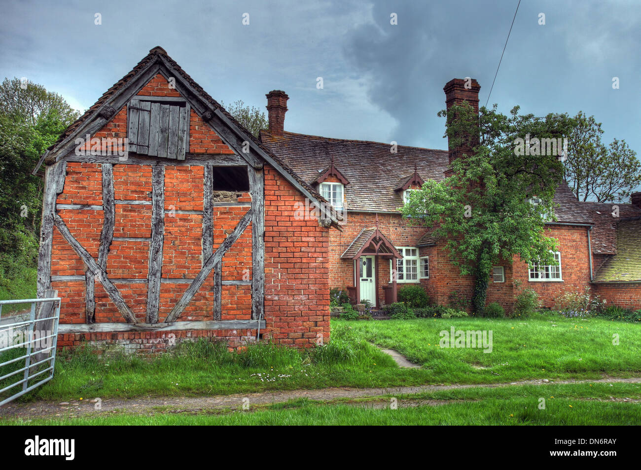 Timber-framed and brick farmhouse, Worcestershire, England. Stock Photo