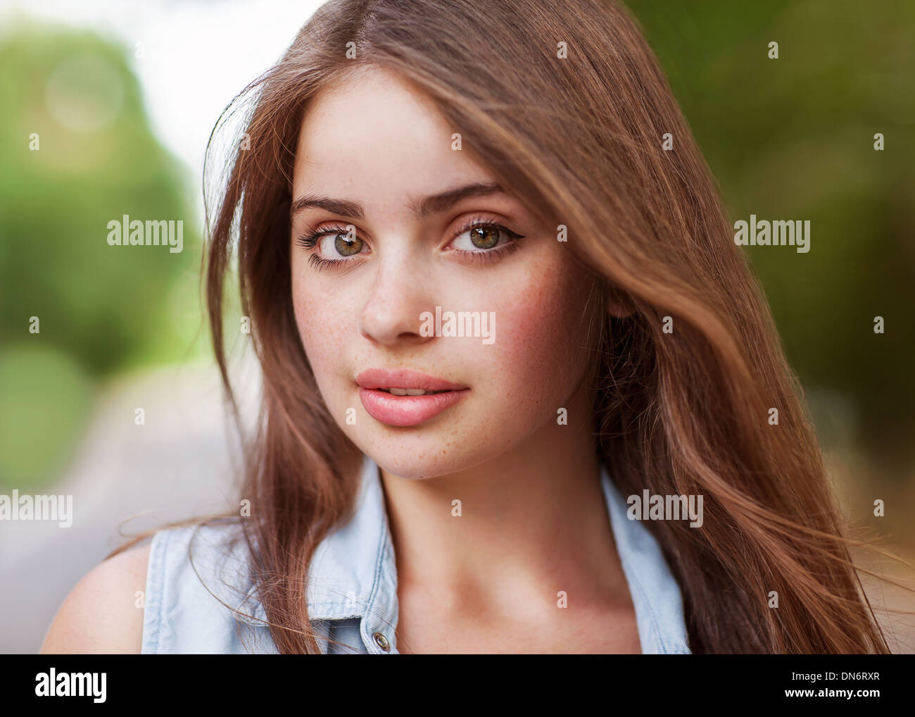 Portrait of a beautiful young girl looking at the camera Stock Photo