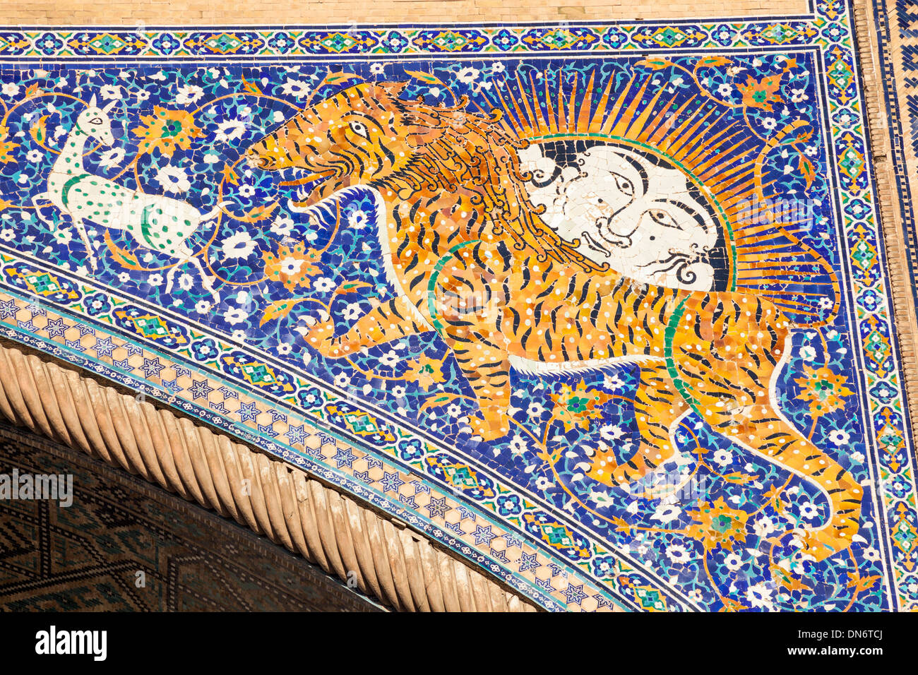 Mosaic on front of Sher Dor Madrasah, also known as Shir Dor Madrasah, Registan Square, Samarkand, Uzbekistan Stock Photo