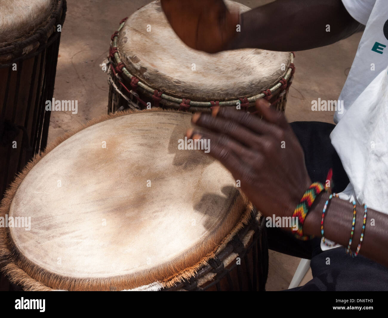 Musician playing the Djembe at a percussion school in Dakar, Senegal Stock Photo
