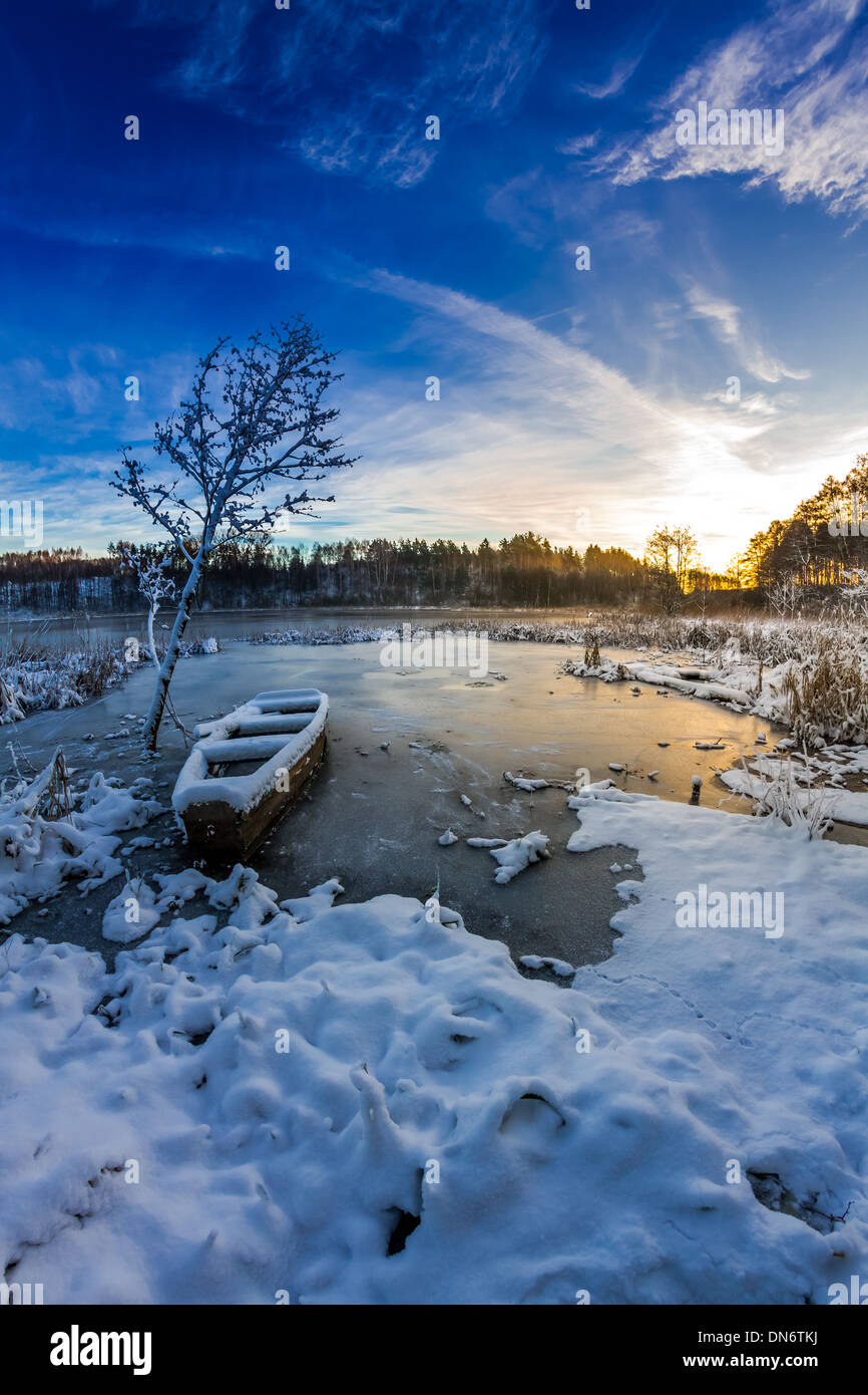 Winter sunrise over the frozen lake Stock Photo - Alamy