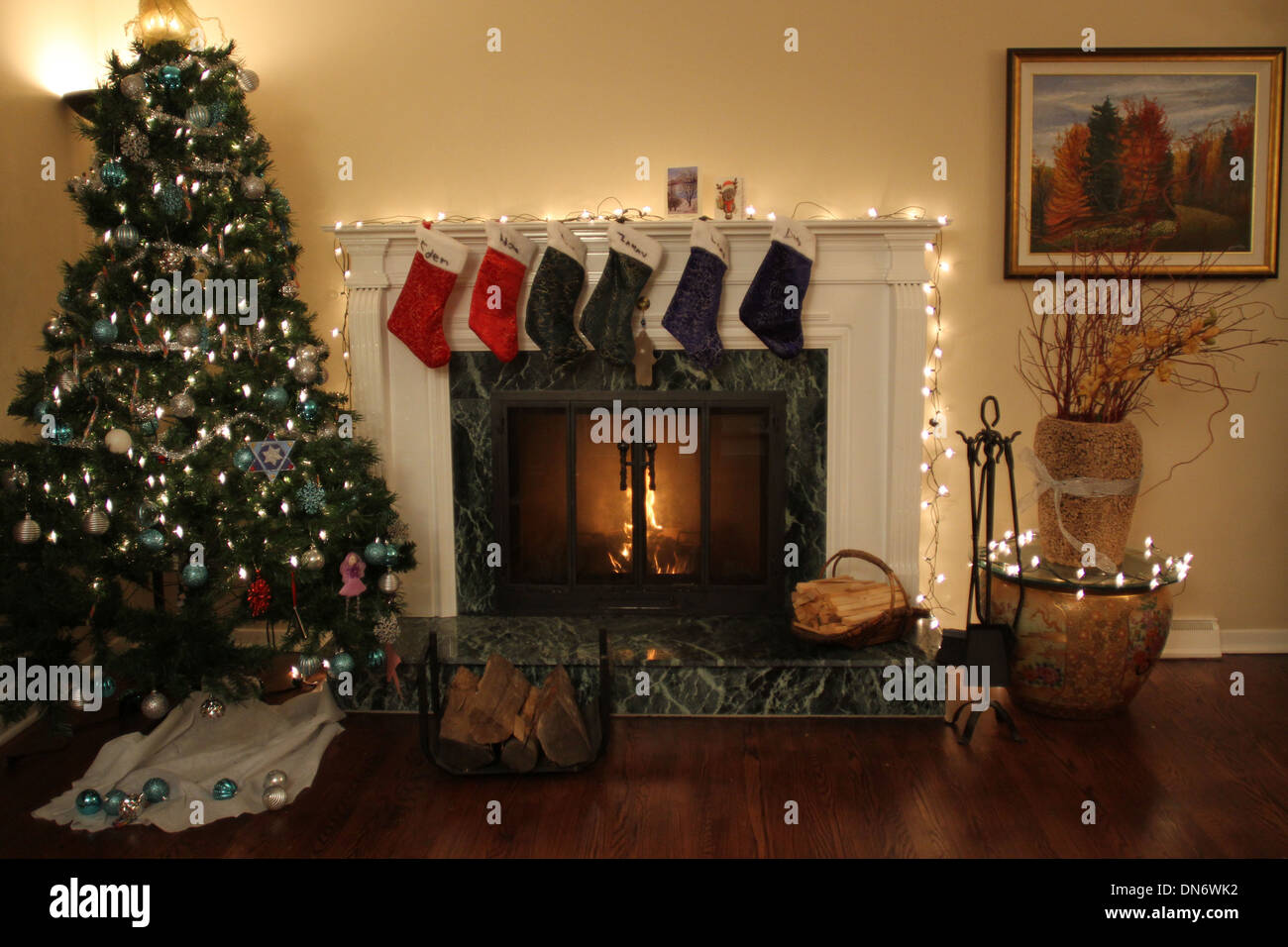 Stockings hung over the fireplace during Christmas Stock Photo Alamy