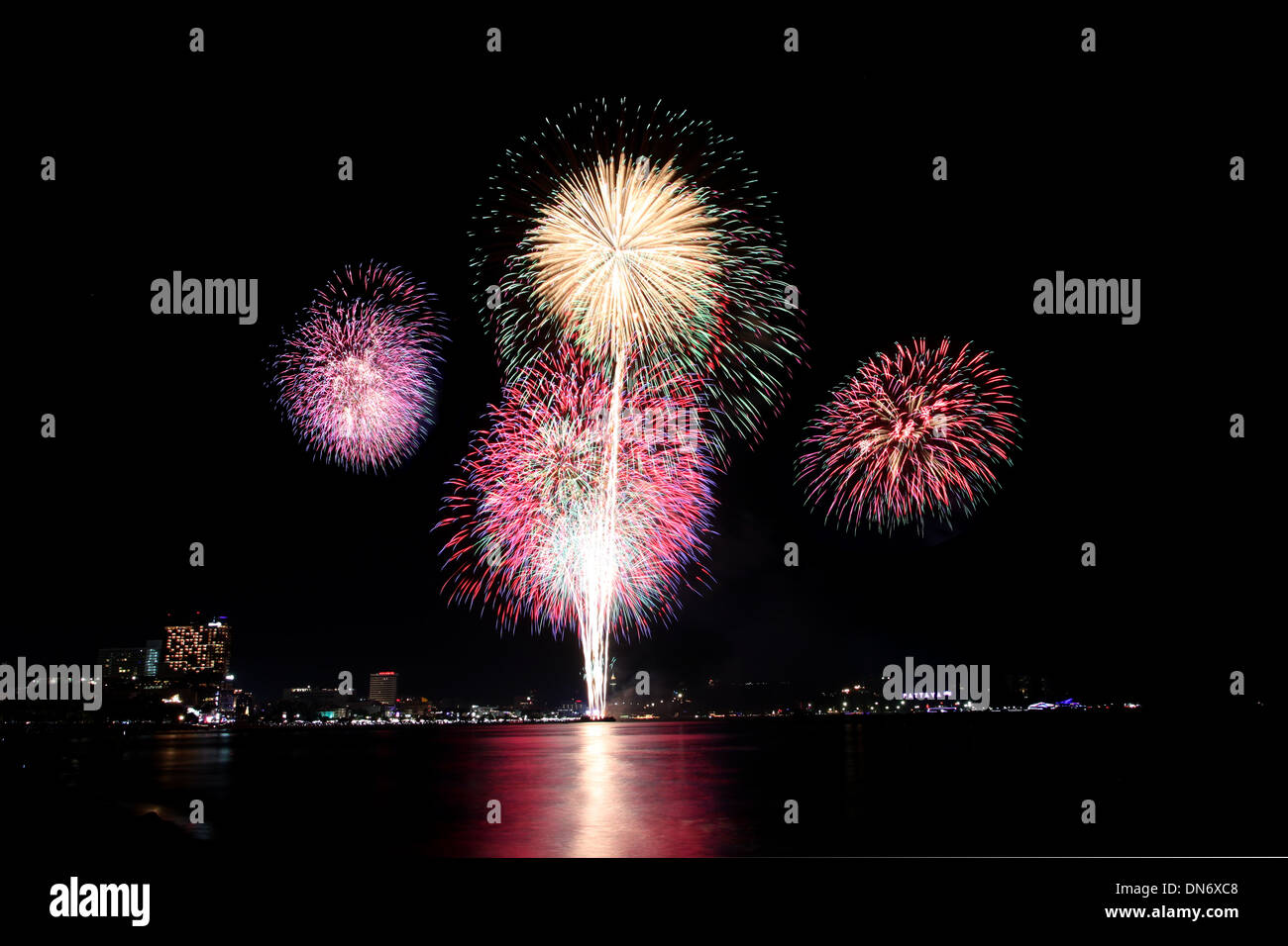 Variety of colors Fireworks or firecracker in the darkness at Pattaya city,Thailand. Stock Photo