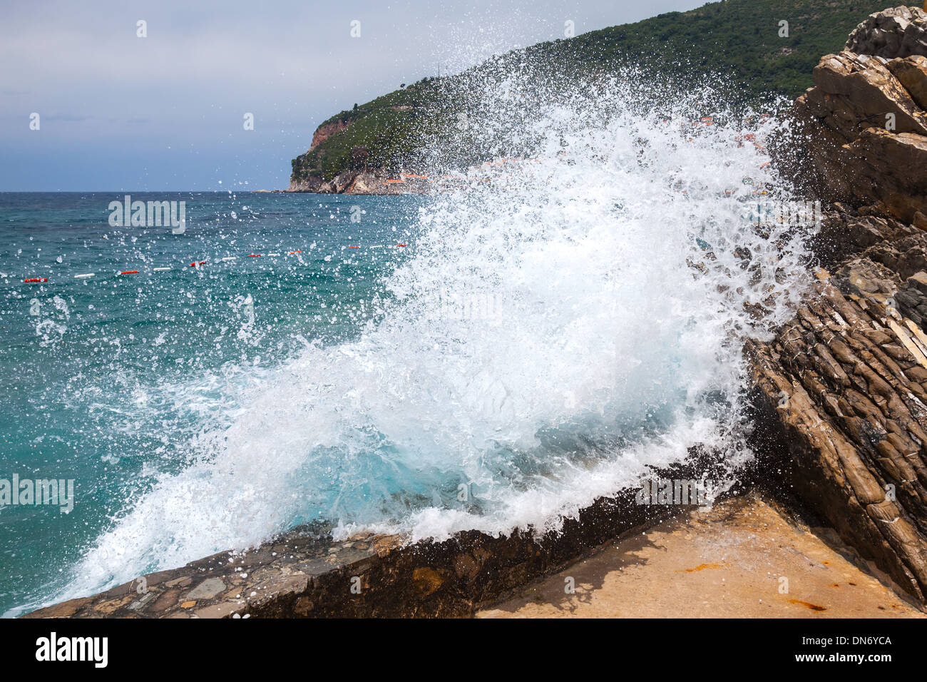 Breaking wave on Adriatic Sea coast in Montenegro Stock Photo