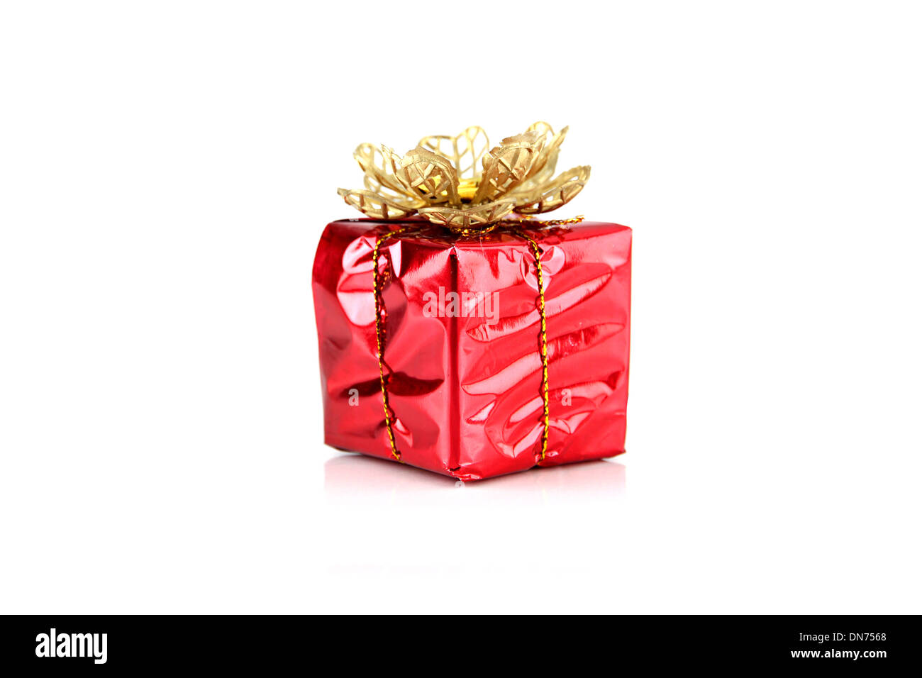 Red gift box on white background Stock Photo - Alamy