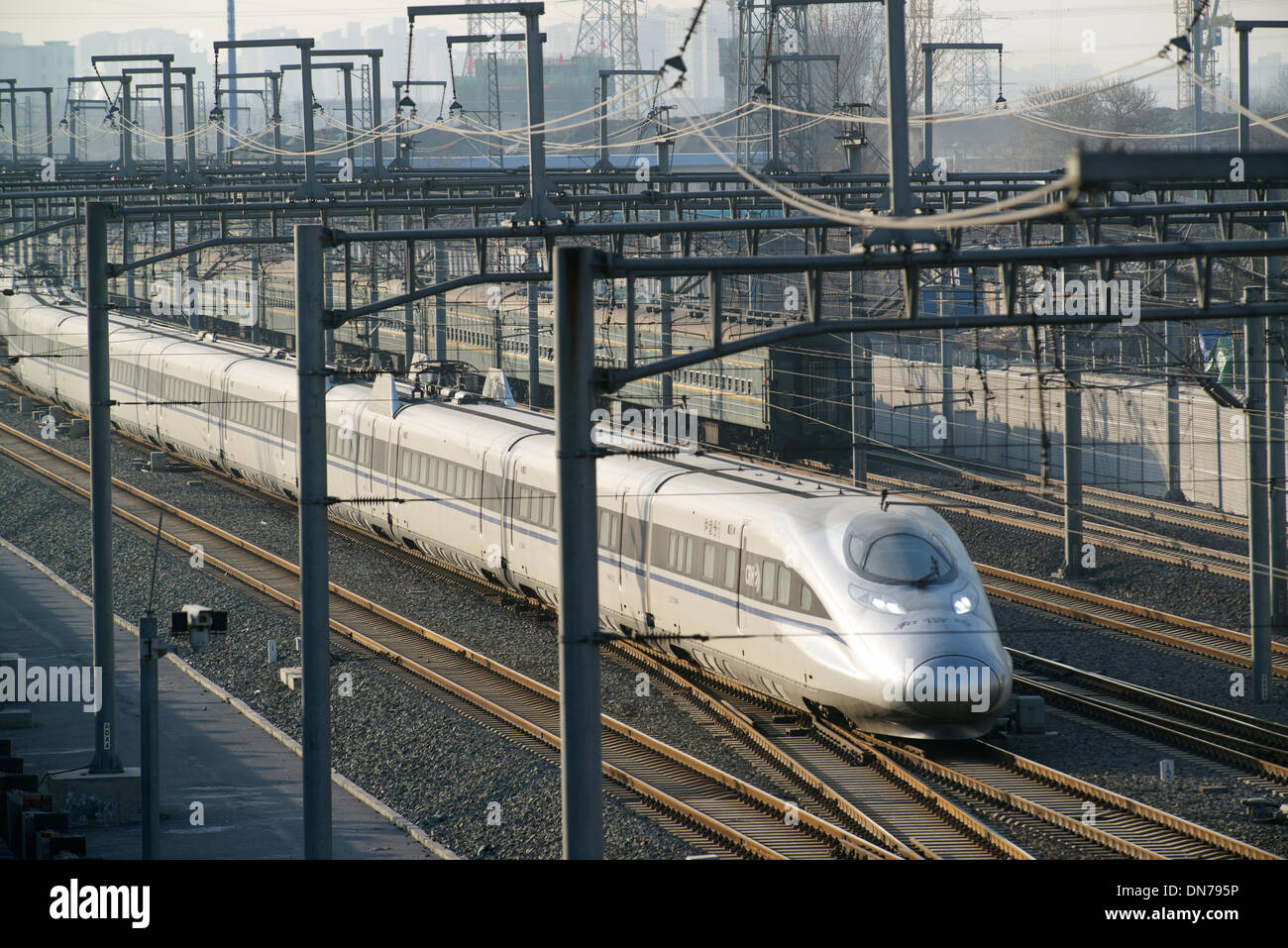 A HSR train is going into Beijing south station in Beijing, China. 15-Dec-2013 Stock Photo