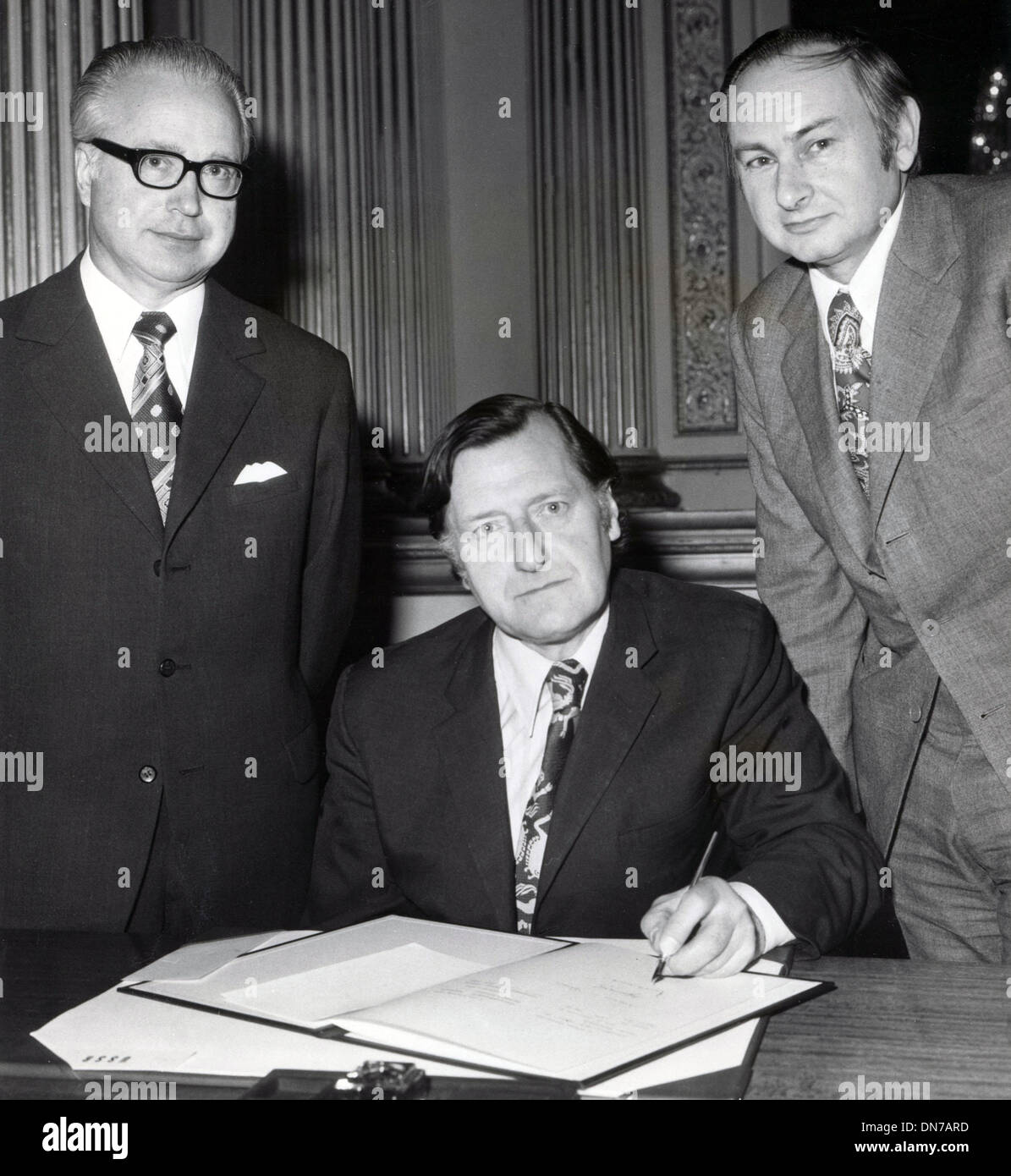 Mar. 26, 1975 - London, England, U.K. - Signing the Certificates of Deposit at Lancaster House are NIKOLAI LUNKOV, DAVID ENNALS and RONALD SPIERS. Stock Photo