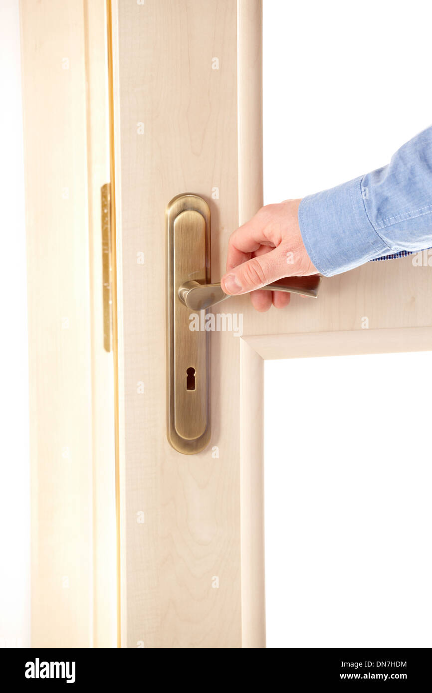 Male hand on handle, opening or closing door Stock Photo