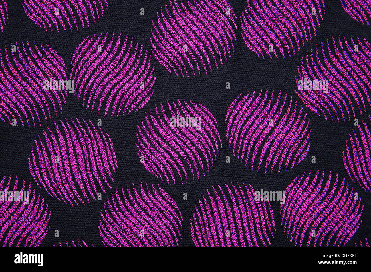 Material in geometric patterns, a colored textile background. Stock Photo