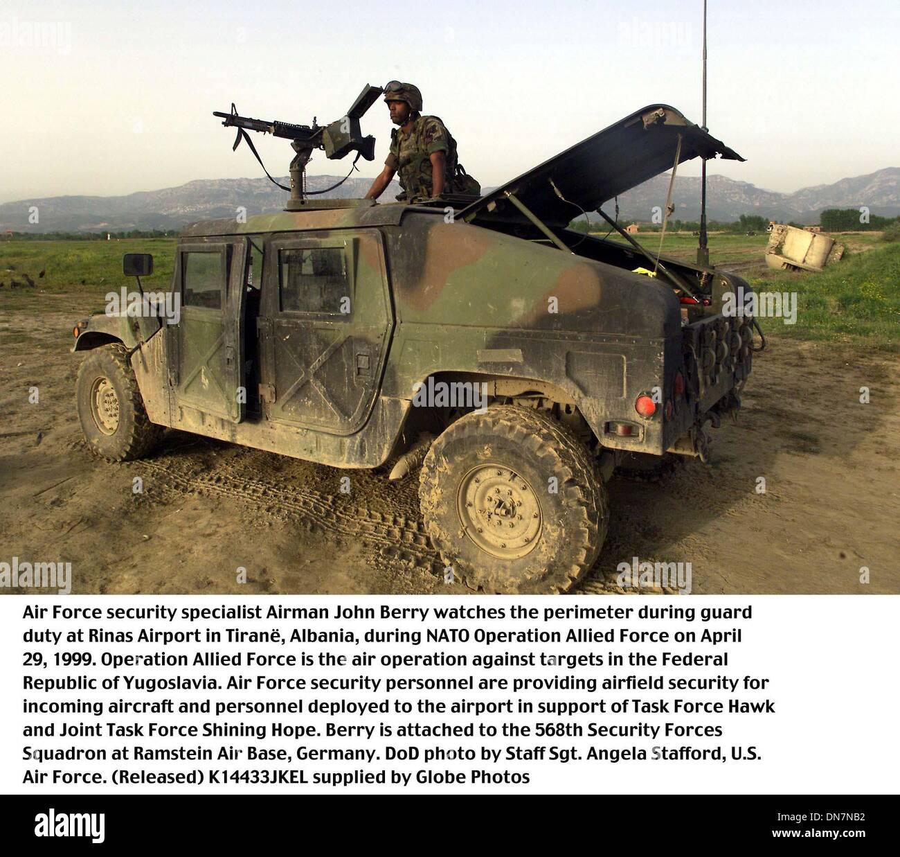 Apr. 1, 1999 - K14433JKEL    990429-F-3968S-022..Air Force security specialist Airman John Berry watches the perimeter during guard duty at Rinas Airport in Tiranâ€˜, Albania, during NATO Operation Allied Force on April 29, 1999.  Operation Allied Force is the air operation against targets in the Federal Republic of Yugoslavia.  Air Force security personnel are providing airfield s Stock Photo