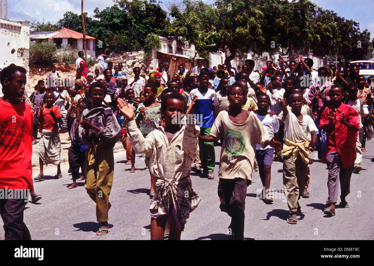 Nov. 30, 1993 - Mogadishu, Somalia - Hundreds of people march through the streets of Mogadishu protesting against the civil war. (Credit Image: © Theodore Liasi/ZUMAPRESS.com) Stock Photo