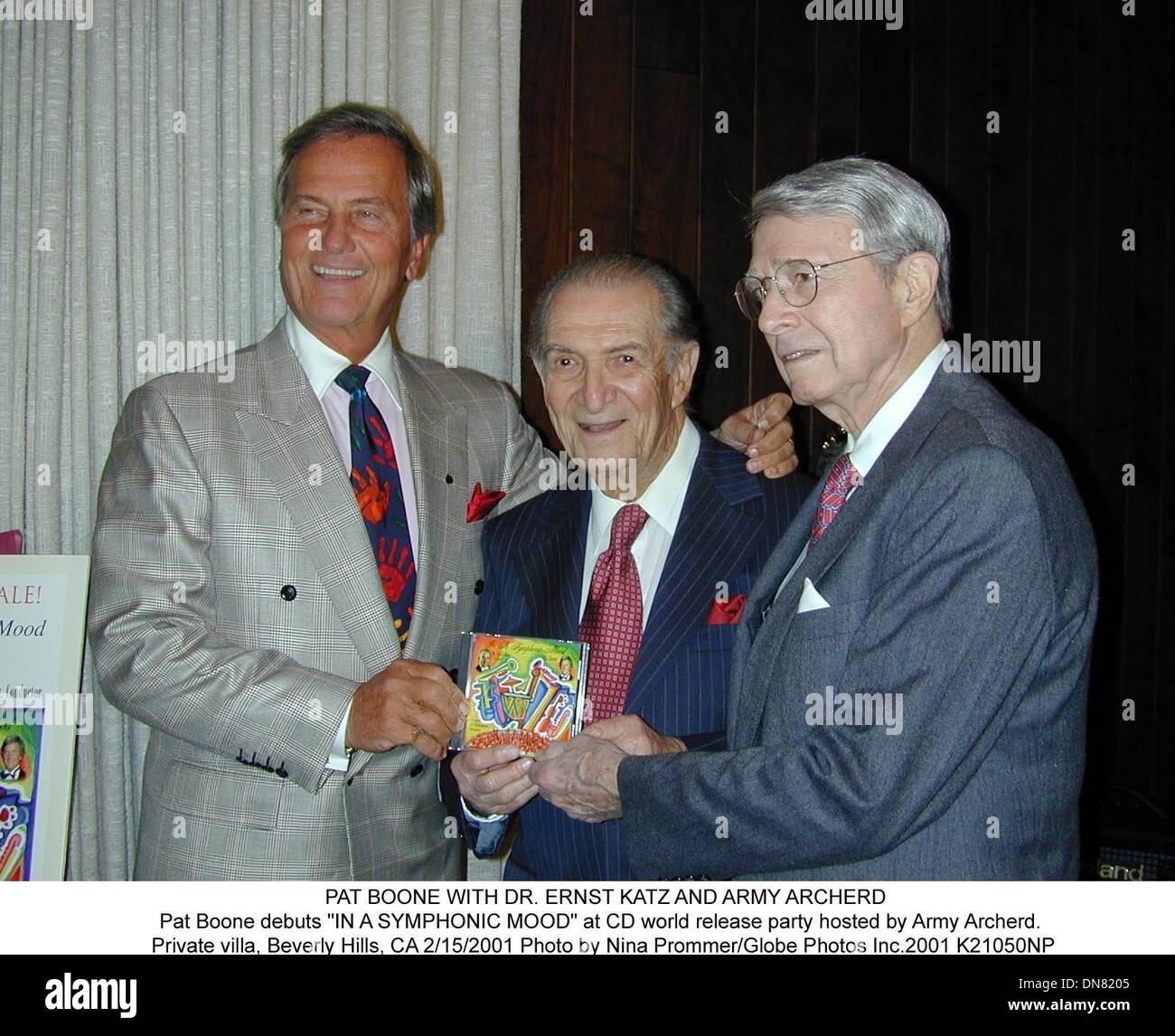 Feb. 15, 2001 - PAT BOONE WITH DR. ERNST KATZ AND ARMY ARCHERD.Pat Boone debuts ''IN A SYMPHONIC MOOD'' at CD world release party hosted by Army Archerd. .Private villa, Beverly Hills, CA 2/15/2001  Nina Prommer/   2001 K21050NP.(Credit Image: © Globe Photos/ZUMAPRESS.com) Stock Photo