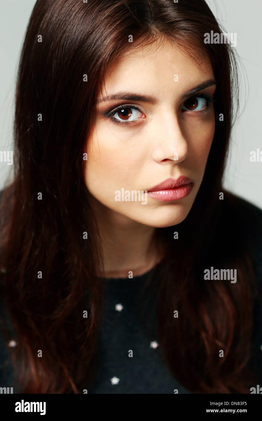 Closeup portrait of a young thoughtful woman Stock Photo - Alamy