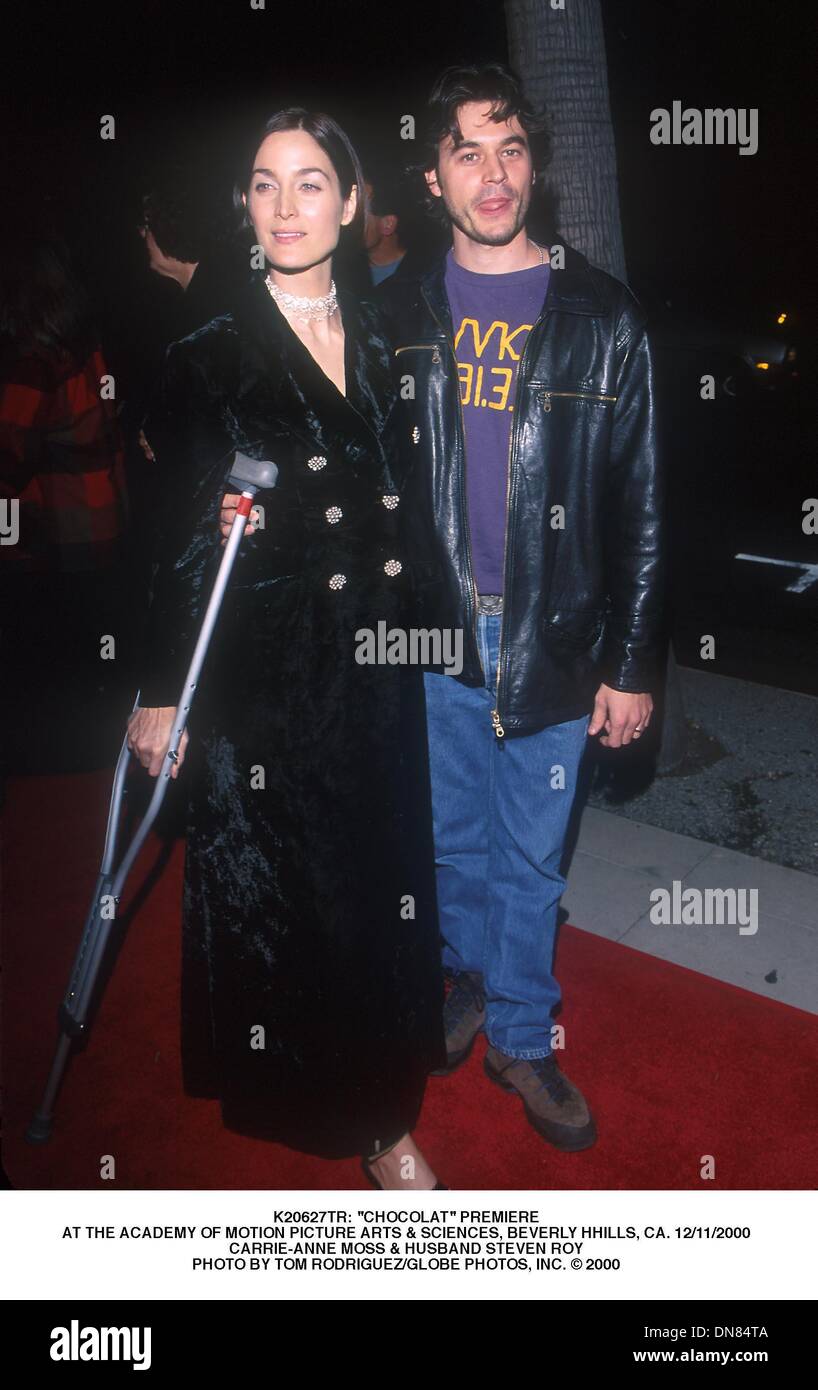 Jan. 31, 2001 - K20627TR: ''CHOCOLAT'' PREMIERE.AT THE ACADEMY OF MOTION PICTURE ARTS & SCIENCES, BEVERLY HHILLS, CA. 12/11/2000.CARRIE-ANNE MOSS & HUSBAND STEVEN ROY. TOM RODRIGUEZ/   2000.(Credit Image: © Globe Photos/ZUMAPRESS.com) Stock Photo