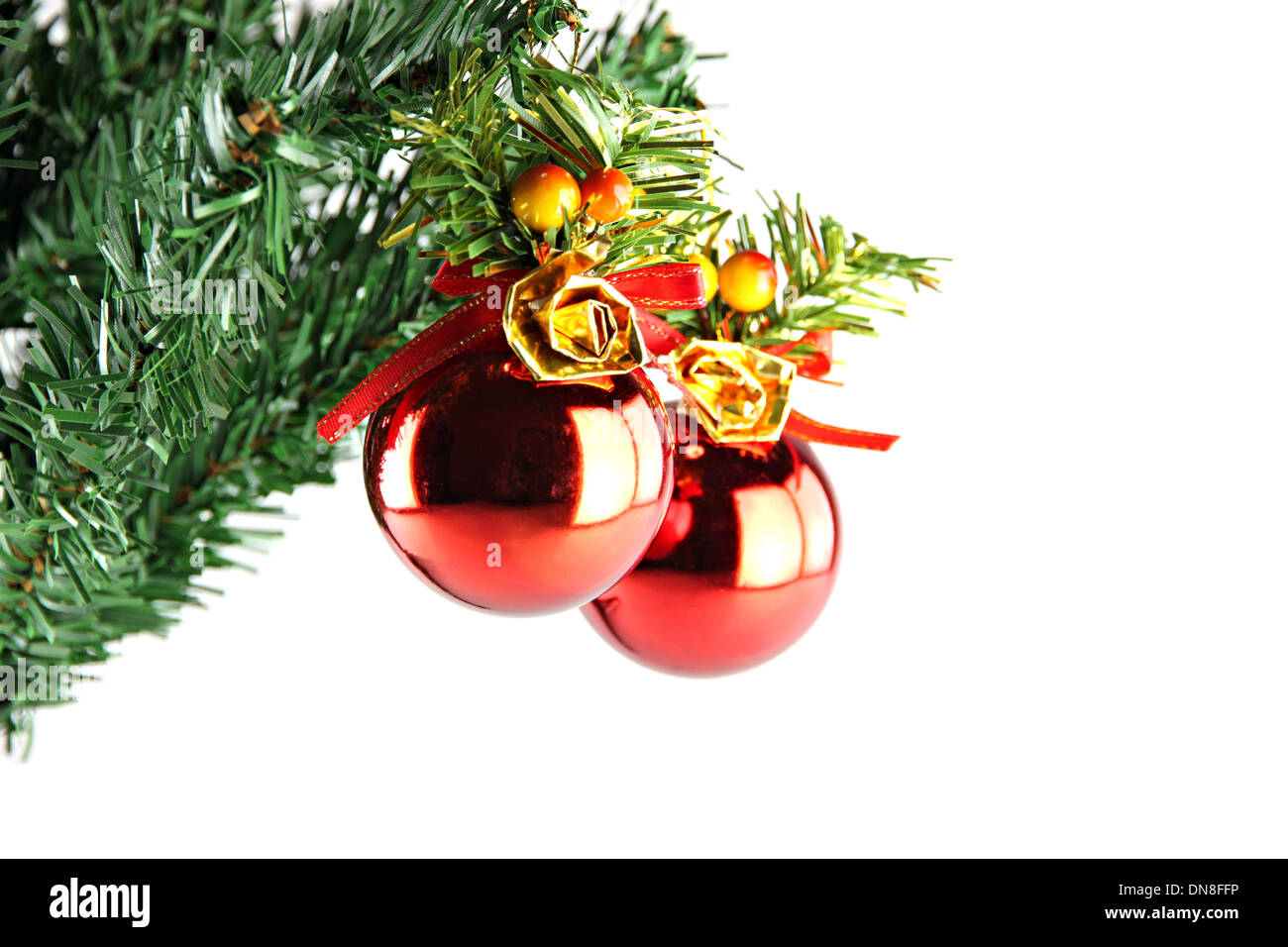 Two Red ball hanging on branch of Christmas tree Stock Photo - Alamy
