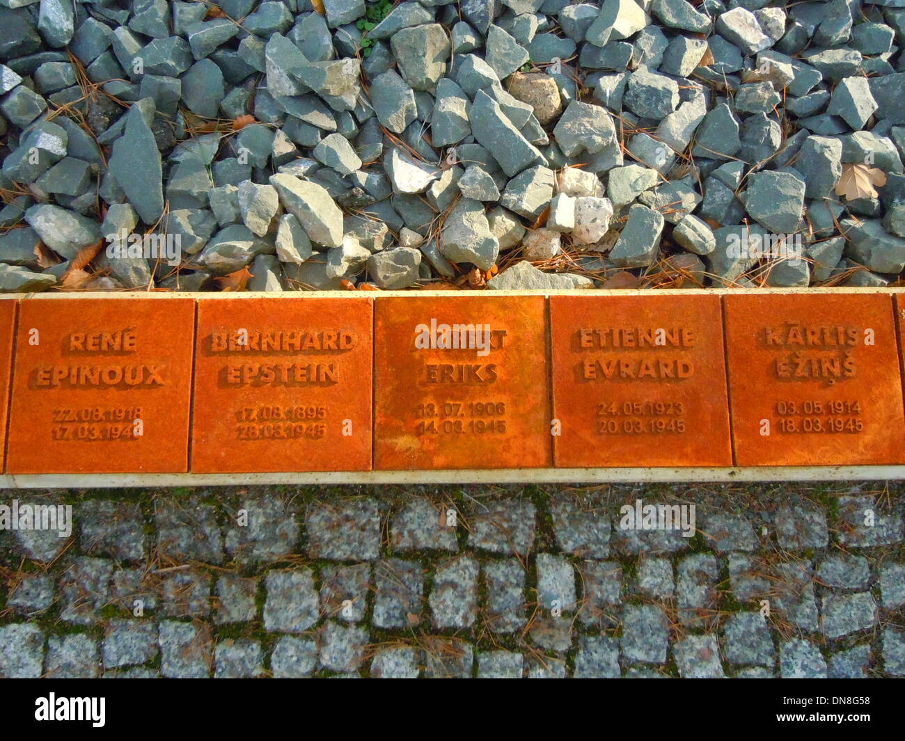 Memorial for concentration camp victims . plates remind of the victims next to a mass grave. The Nazis forced around 7000 prisoners to dig for malachite in the Thekenbergen near Halberstadt. Around 75 % died. Stock Photo