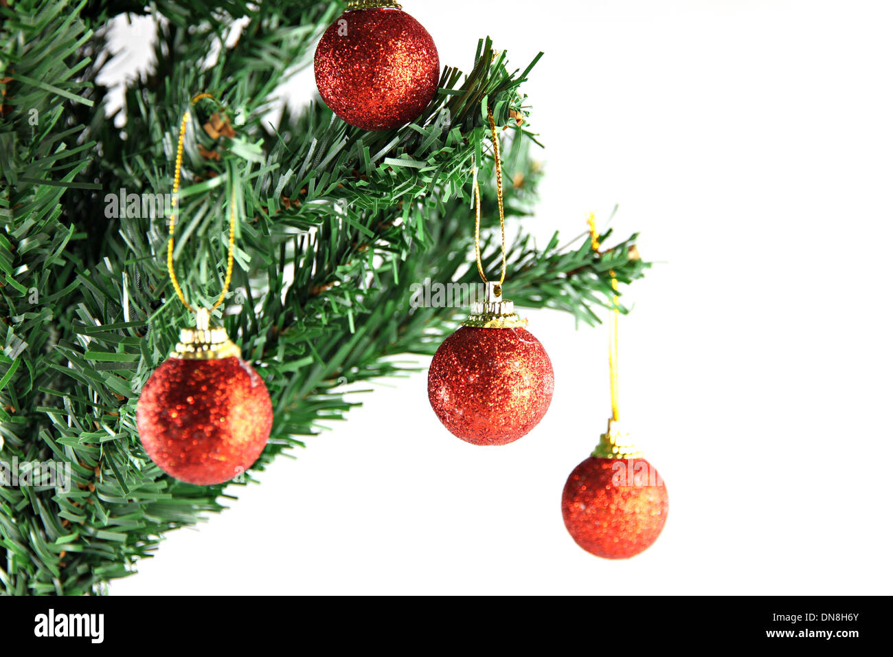 A lot of Red ball hanging on branch of Christmas tree Stock Photo - Alamy