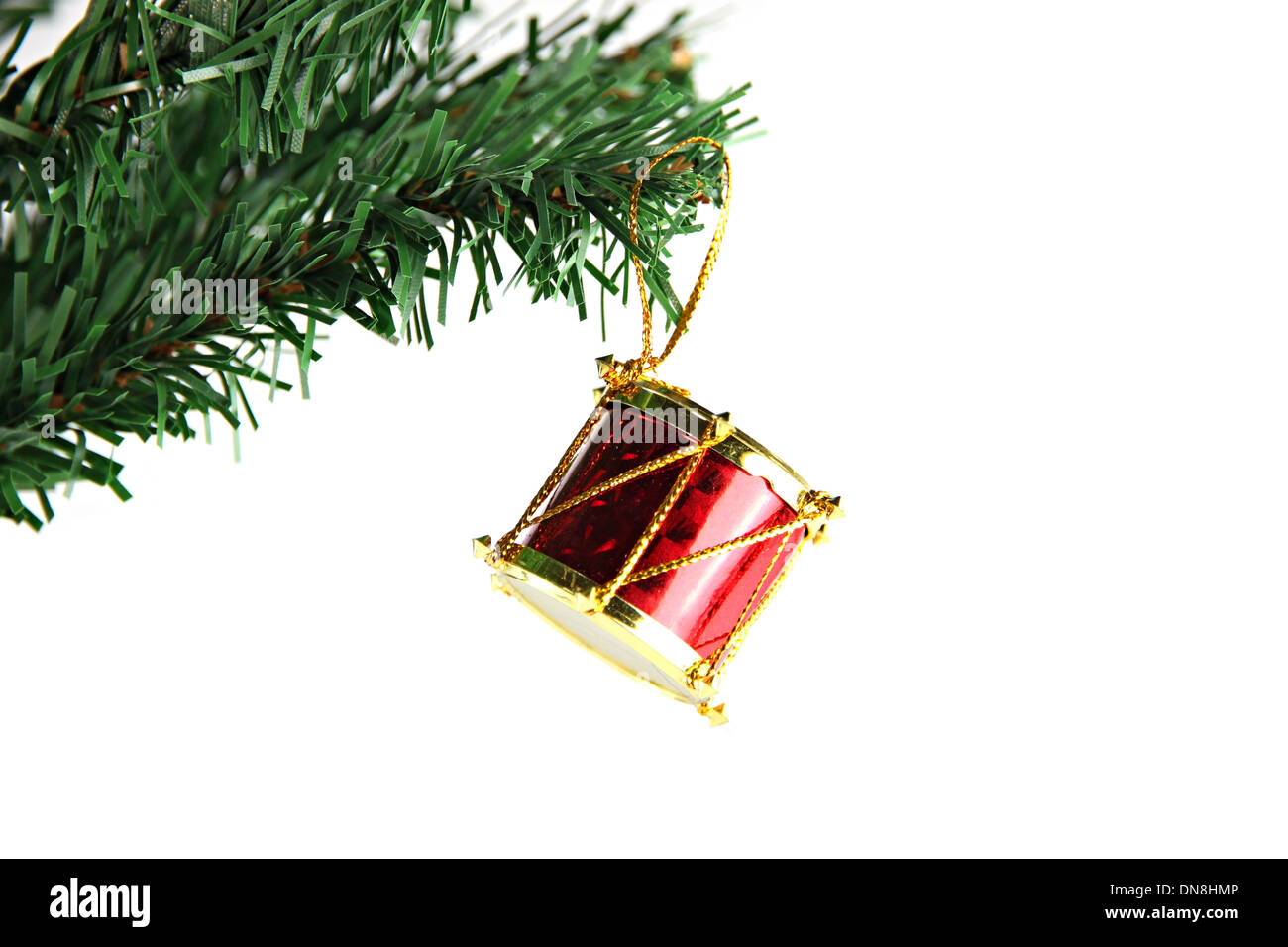 The Picture Red Druml hanging on branch Christmas tree. Stock Photo