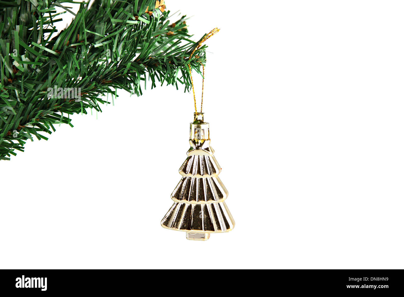 The Picture Golden umbrella hanging on branch Christmas tree. Stock Photo