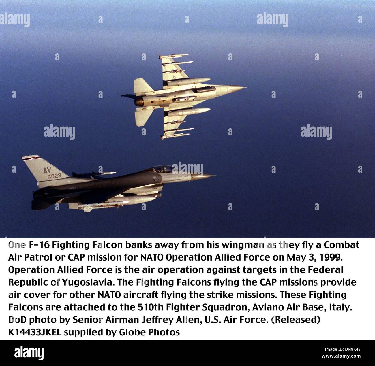 May 1, 1999 - Aviano Ab, Italy - K14433JKEL     05/03/99.990503-F-2171A-008..One F-16 Fighting Falcon banks away from his wingman as they fly a Combat Air Patrol or CAP mission for NATO Operation Allied Force on May 3, 1999.  Operation Allied Force is the air operation against targets in the Federal Republic of Yugoslavia.  The Fighting Falcons flying the CAP missions provide air c Stock Photo