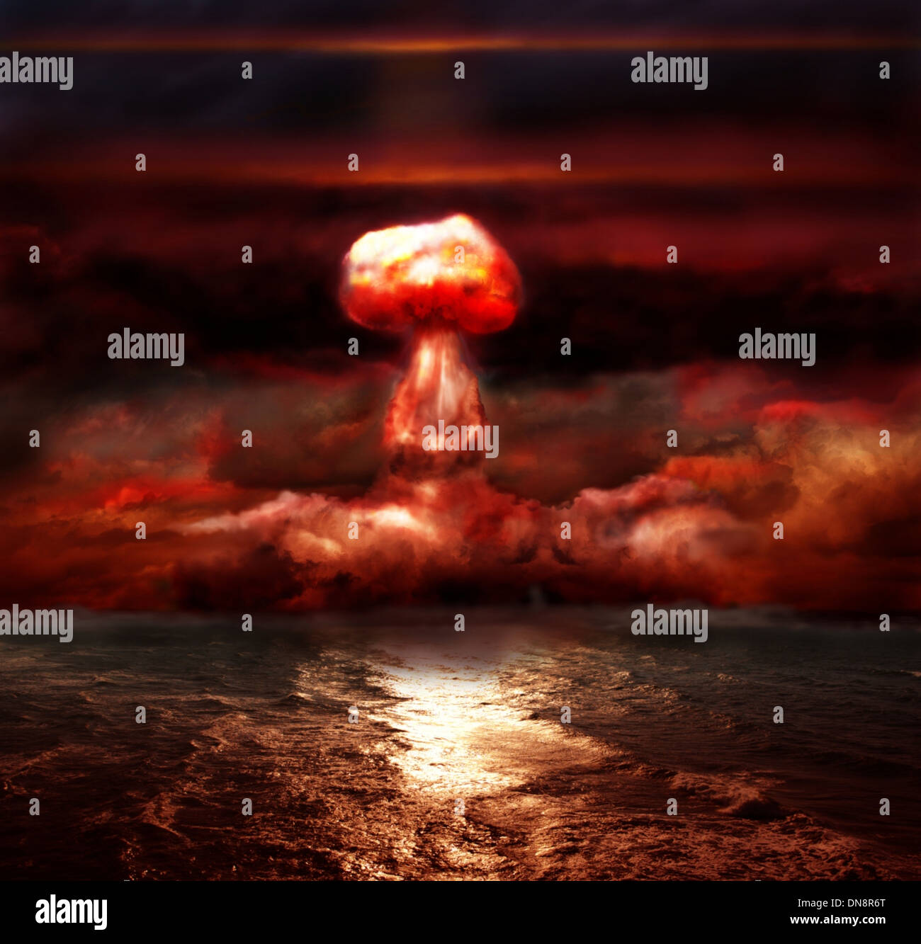explosion of nuclear bomb over sea Stock Photo