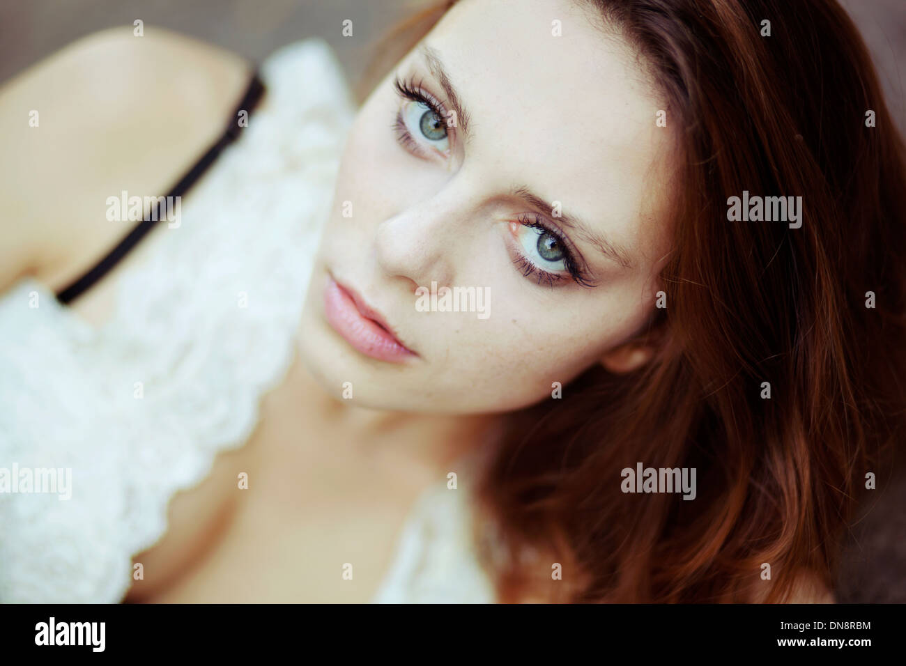 Portrait of young woman looking at camera Stock Photo