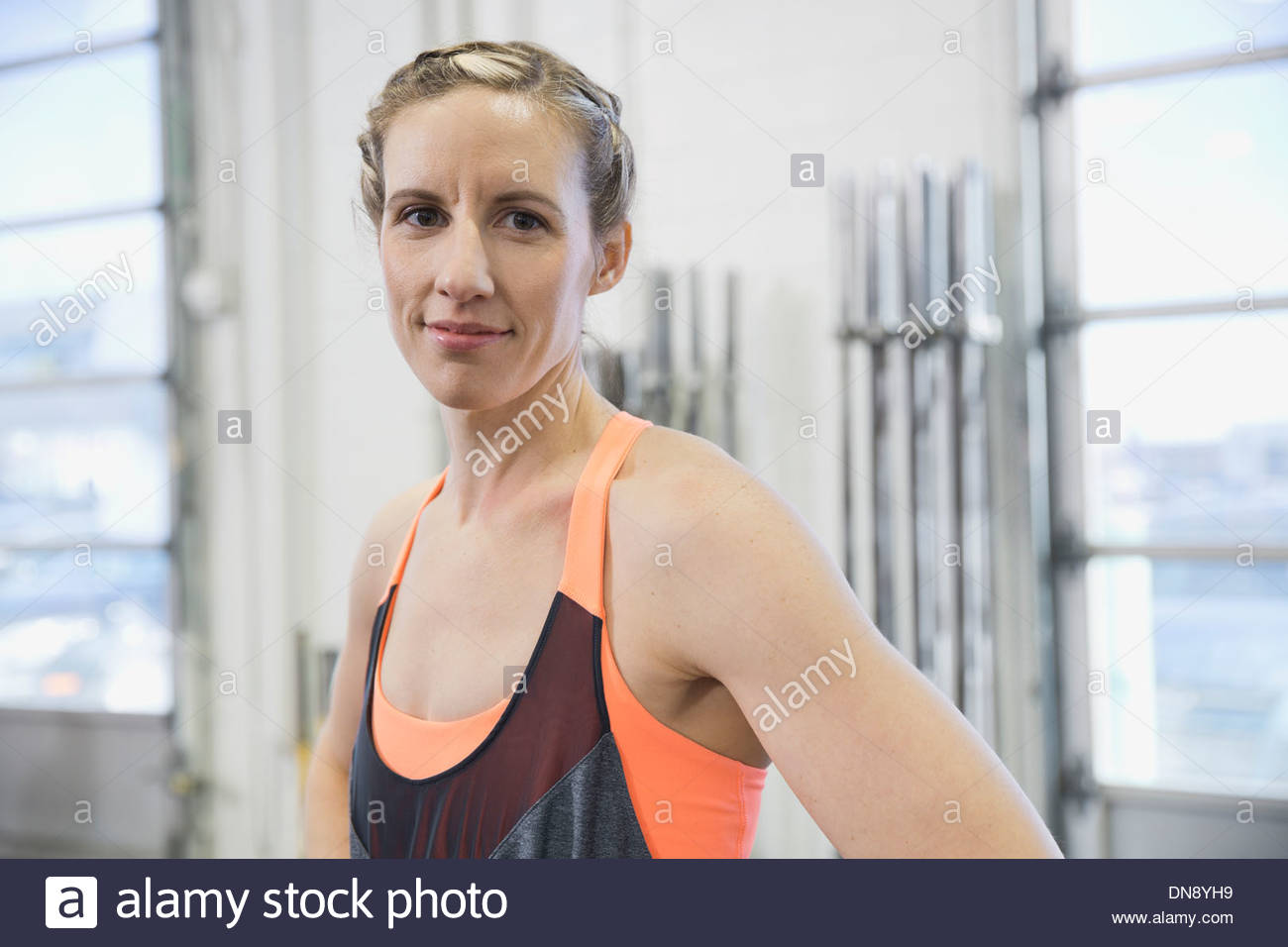 Woman standing in gym hi-res stock photography and images - Alamy