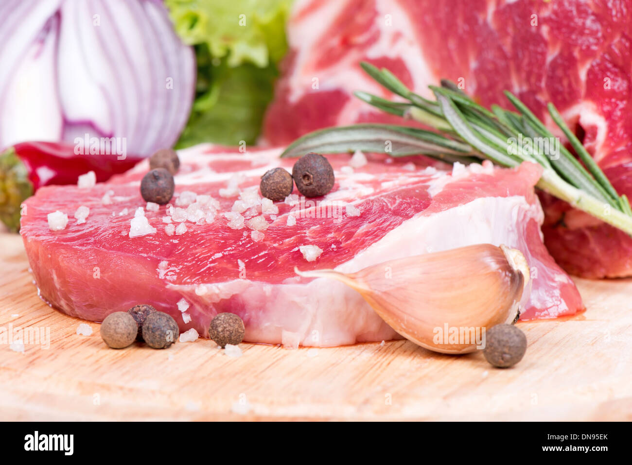 Raw meat, vegetables and spices isolated on white Stock Photo