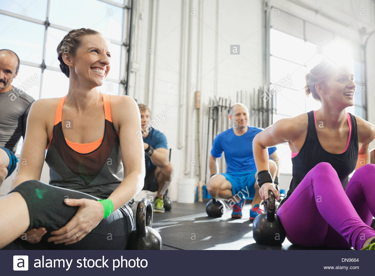 Group working with kettlebells in gym Stock Photo